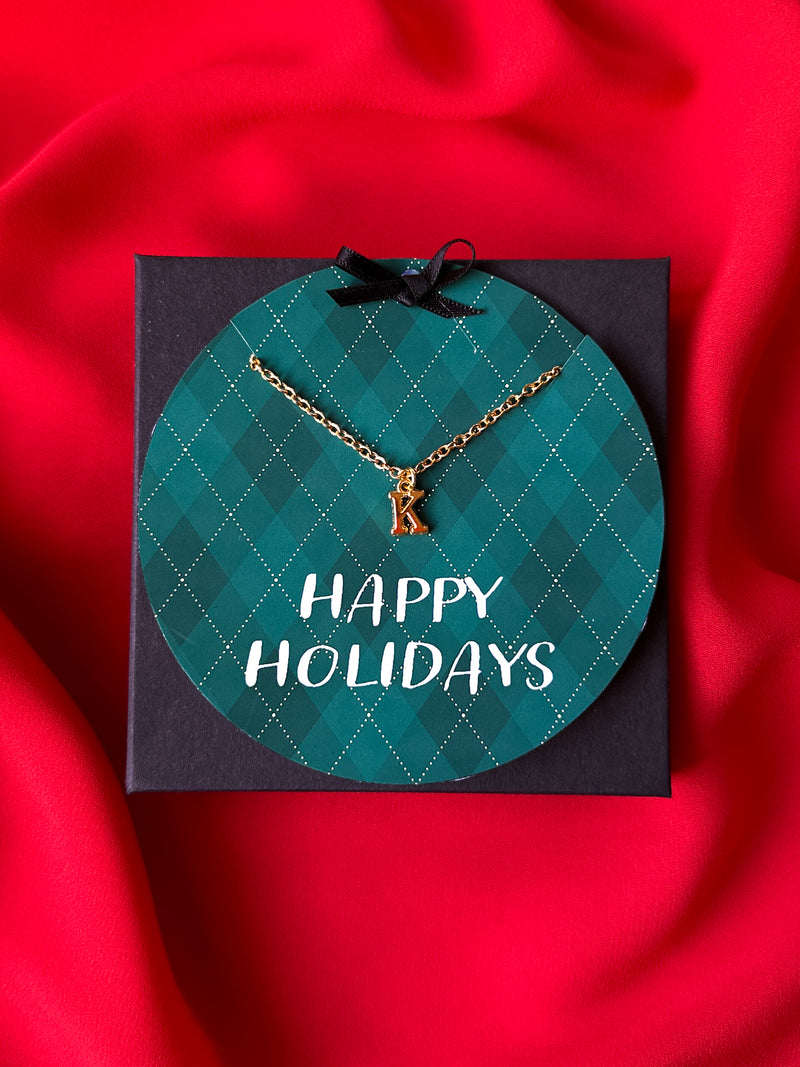 Happy Holiday green argyle letter necklace card