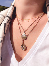 gold layered sun and moon necklace