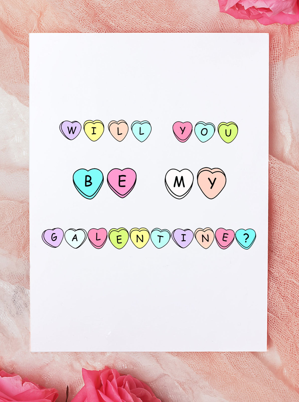 will you be my galentine? written out in colorful heart candy on white greeting card